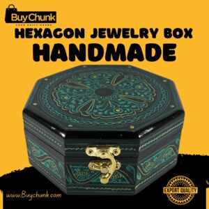 Top-down view of an exquisite green octagon-shaped handmade lacquer art jewelry box with a central emerald mandala floral design and gold accents on a black background. Features an 'EXPORT QUALITY' stamp.