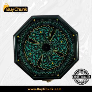 Top-down view of an exquisite green octagon-shaped handmade lacquer art jewelry box with a central emerald mandala floral design and gold accents on a black background. Features an 'EXPORT QUALITY' stamp.