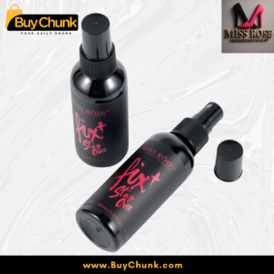 Close-up of two Miss Rose Fix and Stay Over Makeup Fixer bottles, one with its cap off, revealing the fine mist spray nozzle for even application.