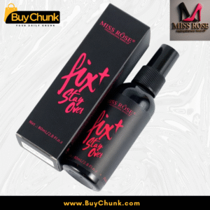 Miss Rose Fix and Stay Over Makeup Fixer bottle next to its black and pink branded box, emphasizing the product's stylish packaging.