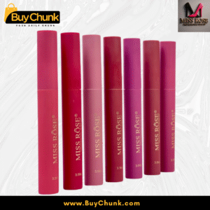 Close-up of Miss Rose Lip Gloss tubes in pink, red, and purple shades on a clean white background