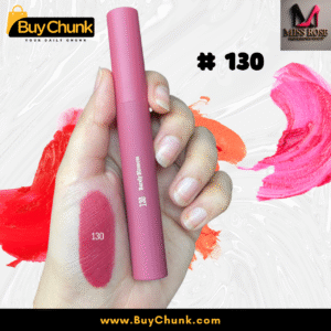 A close-up of a hand swatched with Miss Rose Matte Lip Gloss Shade 130, showing the rich rosy-red color, with the lip gloss tube being held.