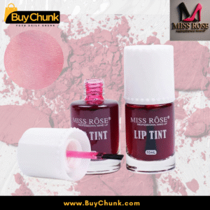 Close-up view of an open Miss Rose Lip Tint bottle, revealing the rich reddish-pink liquid and the doe-foot applicator, highlighting the product's texture and design.