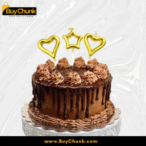 Birthday cake topped with Golden Heart & Star Cake Candles shaped candles.
