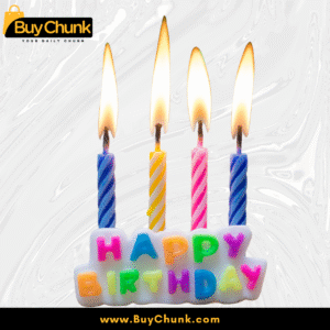 Happy birthday cake topper with four multicolor candles burning brightly.