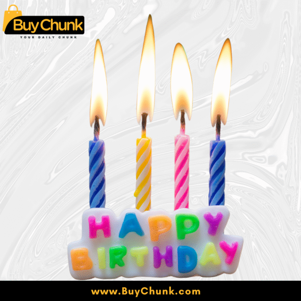 Happy birthday cake topper with four multicolor candles burning brightly.