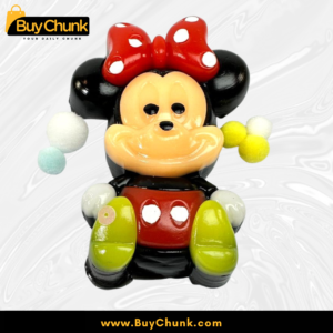 Hand holding cute red bow mouse squishy stress toy