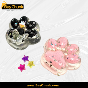 close-up of soft glitter paw squishies with stars