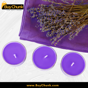 Home 144 close-up of lavender scented candles glowing with soothing fragrance