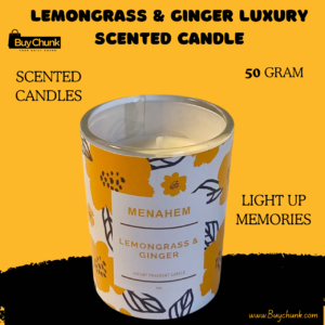 Elegant lemongrass and ginger luxury candle in glass jar.