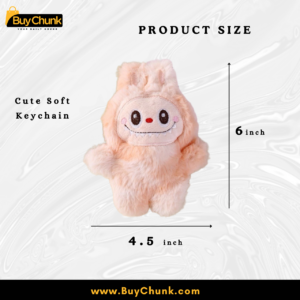 Close-up showing soft plush texture of Labubu Peach charm and stitching.