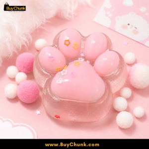 Compact pink paw squish held comfortably in one hand for squeezing