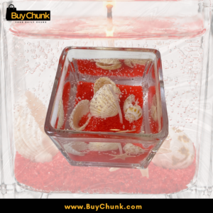 Decorative red gel candle with seashell styling for Pakistani homes and gifting