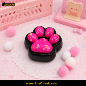 Soft pink paw squishy designed for relaxing sensory play and stress relief